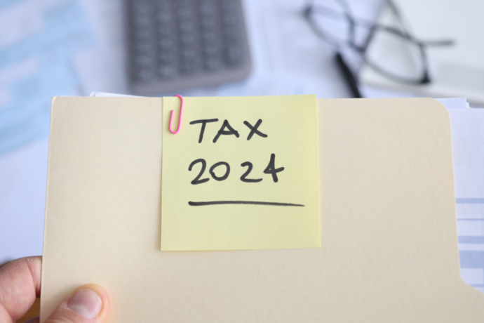 Folder with 'Tax 2024' sticky note